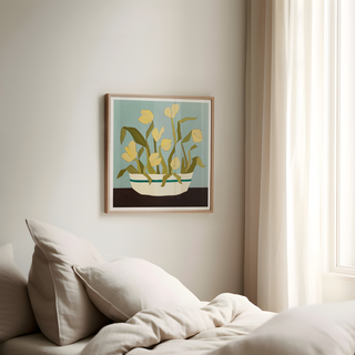Yellow tulips floral art print in striped ceramic bowl with blue background